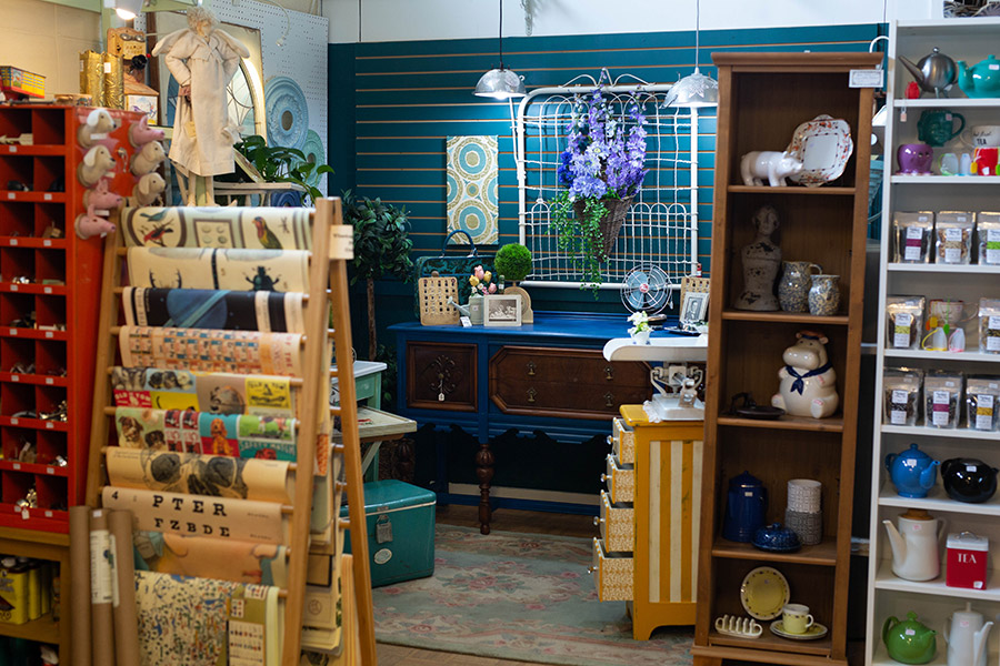 A vendor's booth with a blue theme